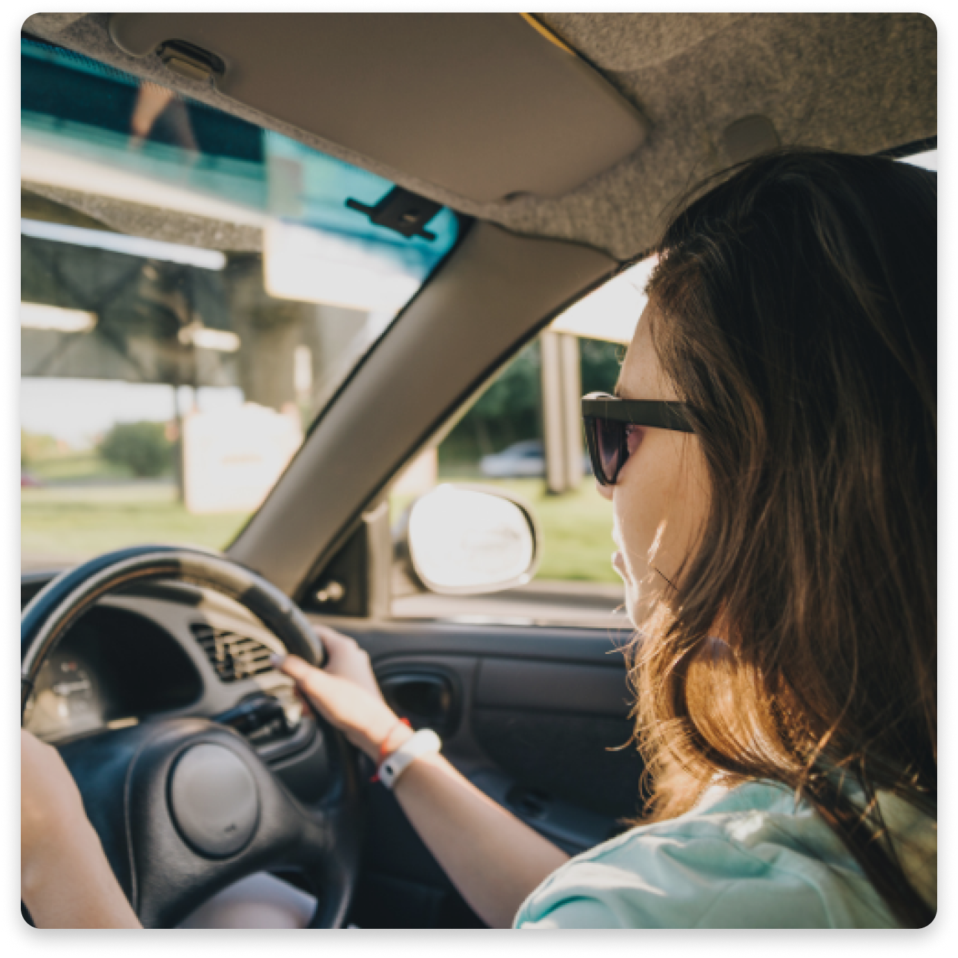 Woman driving with black box insurance